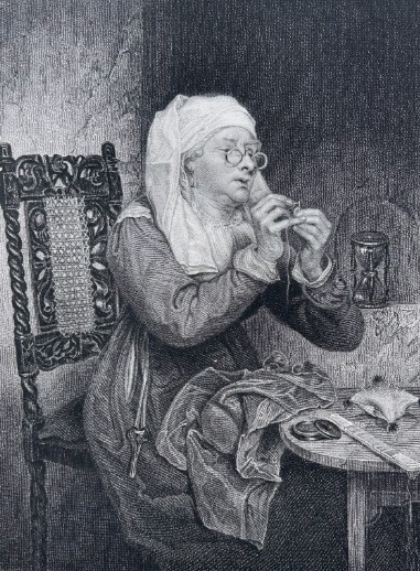 A monochrome nineteenth-century steel engraving depicting an elderly woman wearing spectacles and a headscarf threading a needle while seated at a small wooden table. View VII