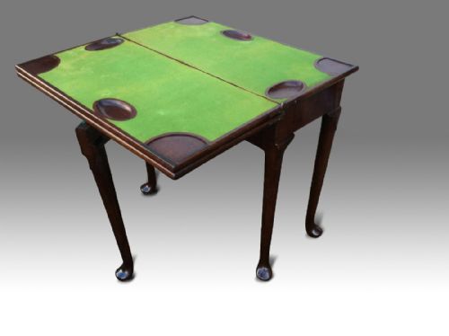 A FINE GEORGE II MAHOGANY TRIPLE FOLD GAMES AND TEA TABLE - ADDITIONAL PHOTO 4