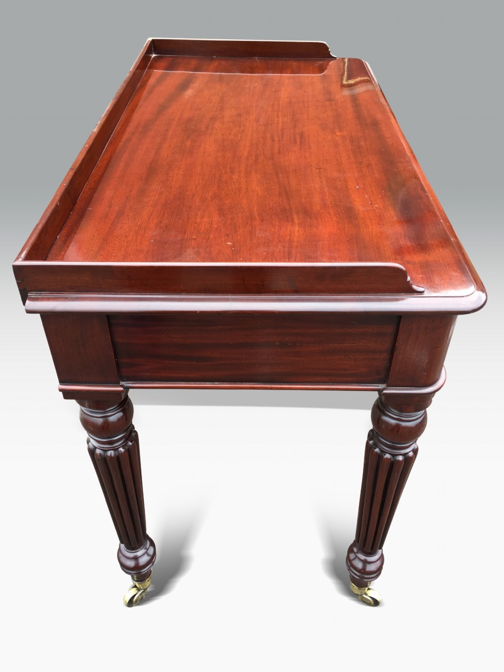 Mahogany writing or dressing table attributed to GILLOWS & stamped by M WILSON, 68 GREAT QUEEN STREET. LONDON View II