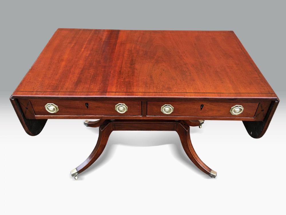 A FINE REGENCY MAHOGANY & EBONY INLAID SOFA TABLE View III