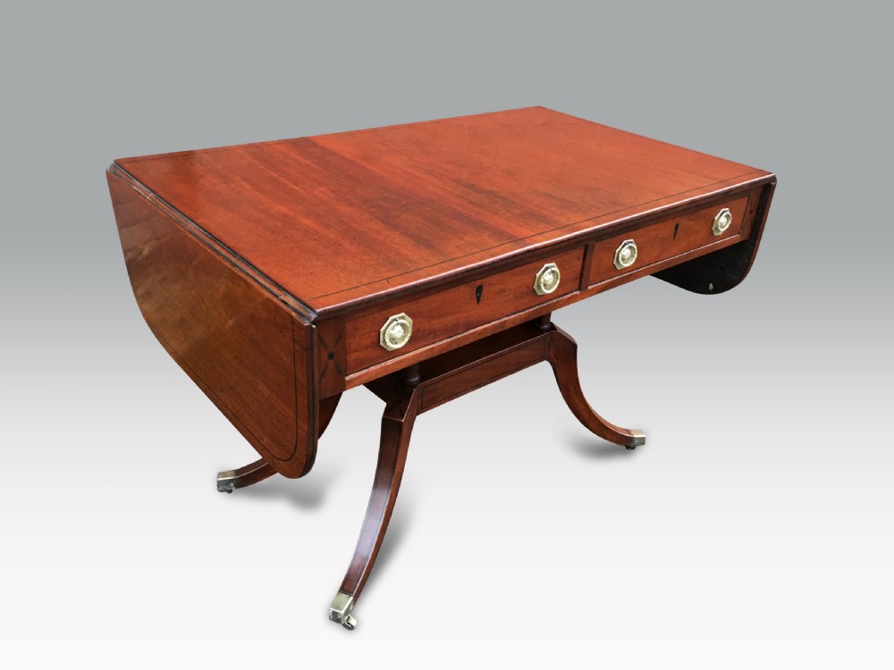 A FINE REGENCY MAHOGANY & EBONY INLAID SOFA TABLE View IV