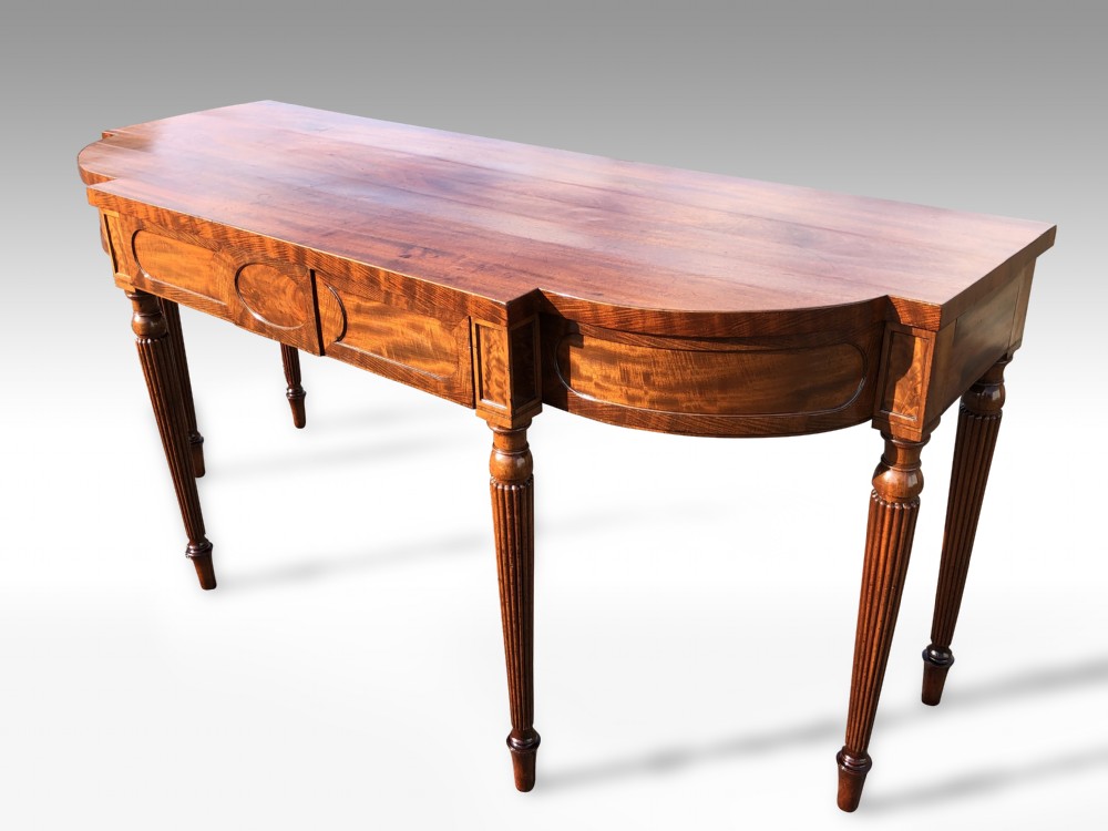A wonderful George III Mahogany breakfront serving table in the manner of Gillows View III
