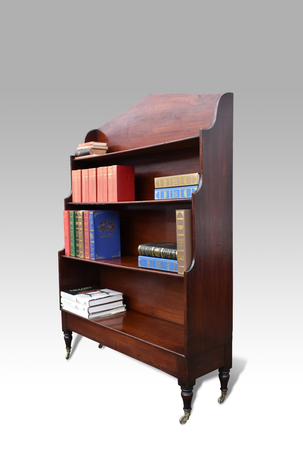 A WILLIAM IV MAHOGANY WATERFALL BOOKCASE
