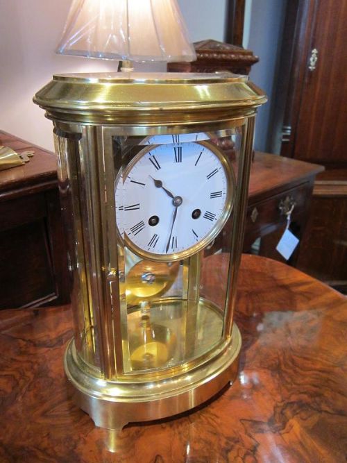 Fine Victorian Oval Four Glass Clock