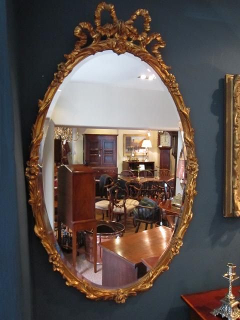 Fine Pair of Giltwood Oval Wall Mirrors