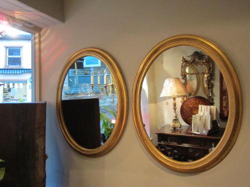 Matching Pair of Victorian Gilt Oval Mirrors