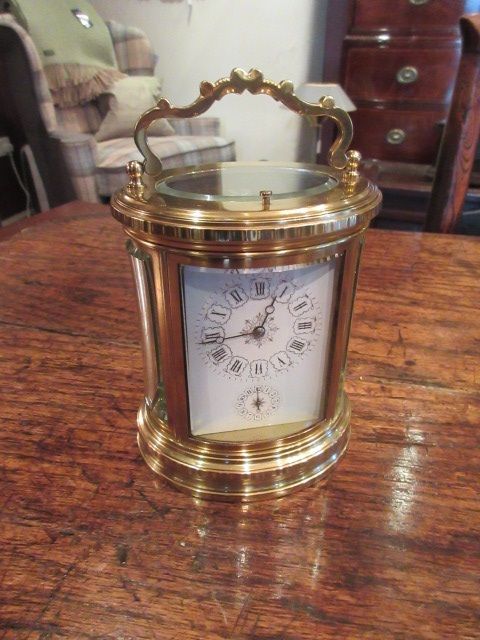 Impressive 19th Century Oval Striking Carriage Clock