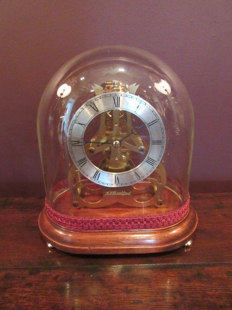 Small Skeletonised Mantel Clock & Glass Dome