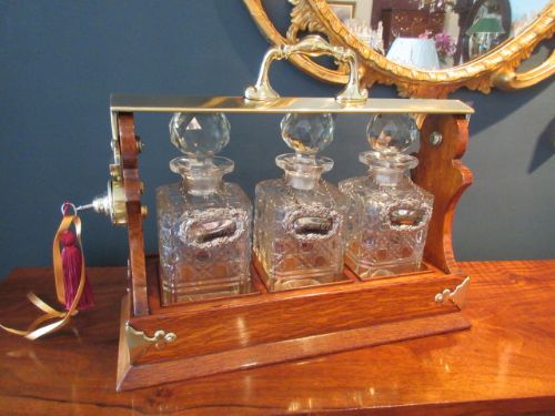 Late Victorian Polished Oak Three Bottle Tantalus