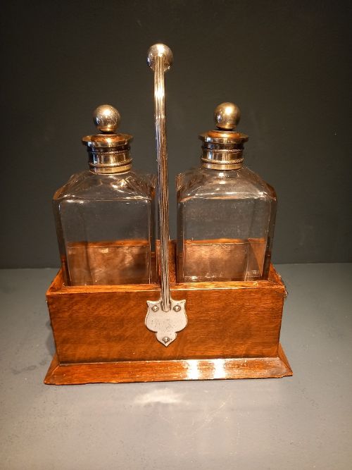 Antique Oak Cased Two Bottle Decanter Set