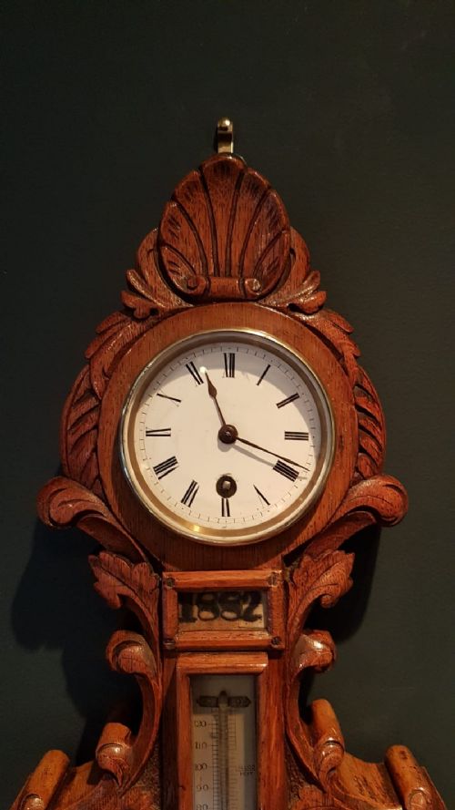 fig 2. Unusual Victorian Carved Oak Barometer Clock and Calendar combination