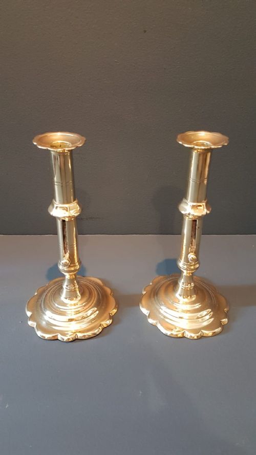 Pair of George III Brass Petal Base Candlesticks