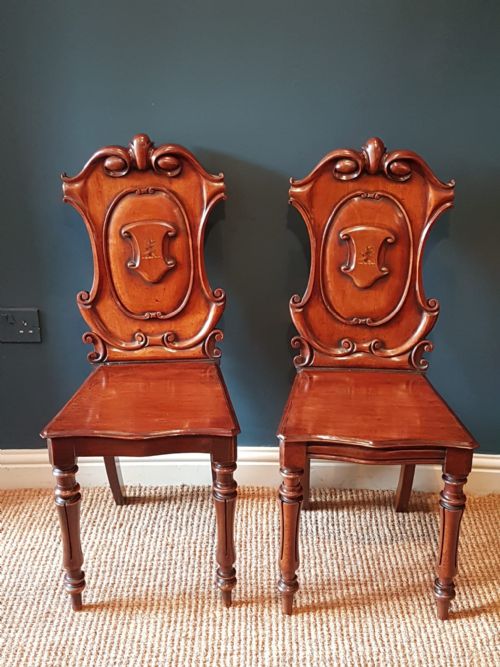 Pair of William IV Mahogany Crested Hall Chairs
