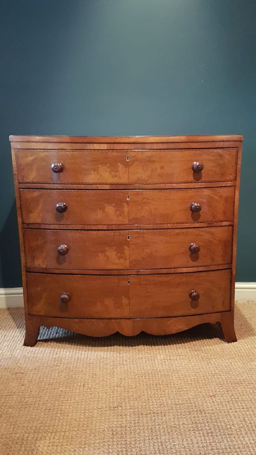 Inlaid Figured Walnut Bow Front Chest