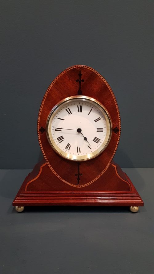 Fine Quality Elliptical Inlaid Mahogany Mantel Clock