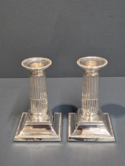 Pair of Victorian Silver Reeded Column Candlesticks