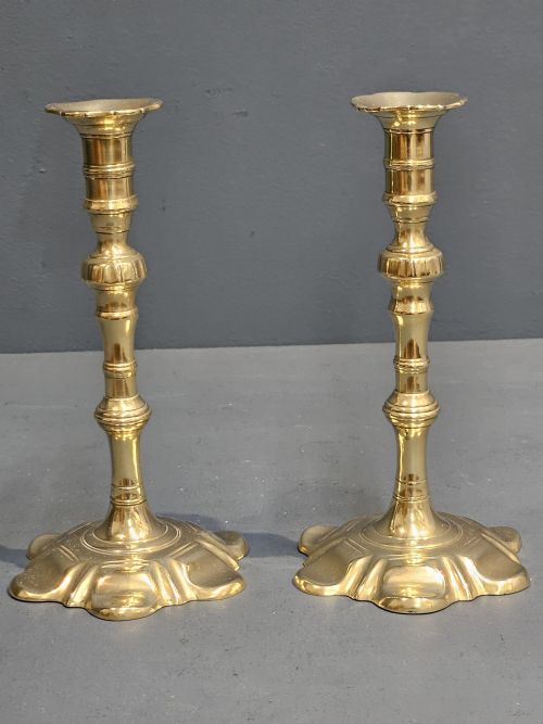 Pair of George III Brass Petal Base Candlesticks
