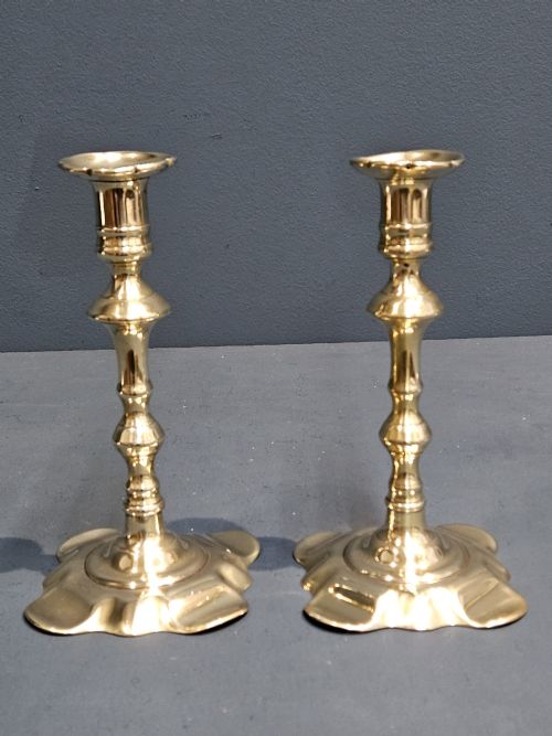 PAIR OF GEORGE III BRASS PETAL BASE CANDLESTICKS
