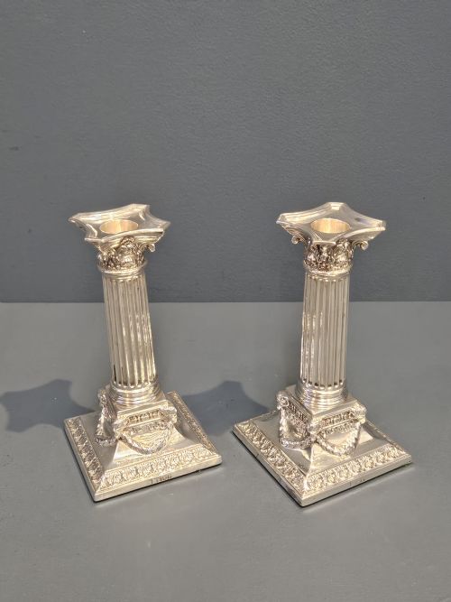 Pair of Edwardian Silver Reeded Column Candlesticks