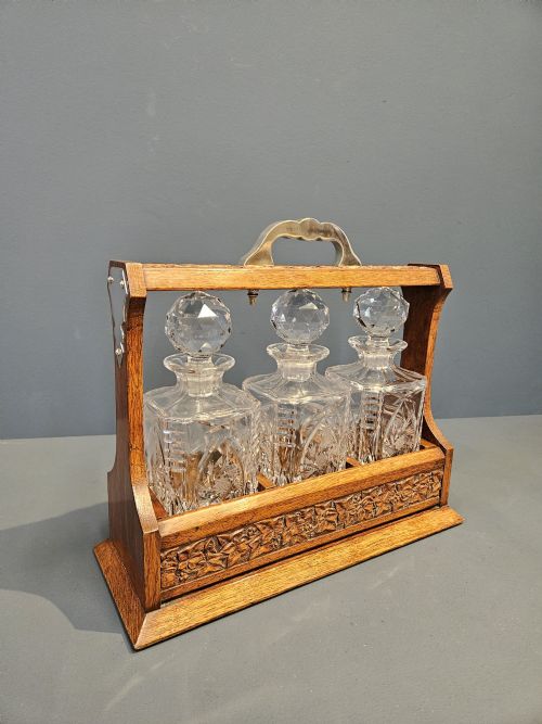Victorian Carved Oak Three Bottle Tantalus