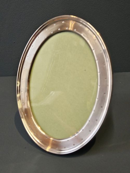 Early George V Oval Silver Engine Turned Photo Frame by William Comyns