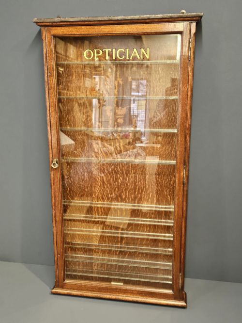 Edwardian Oak Wall Mounted Opticians Cabinet