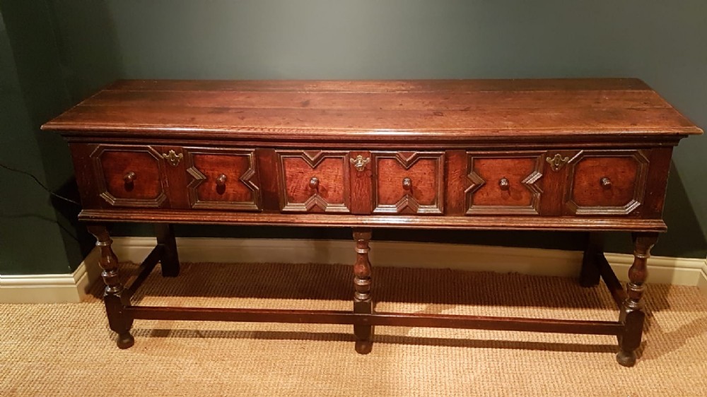 Early Period Oak Geometric Moulded Dresser