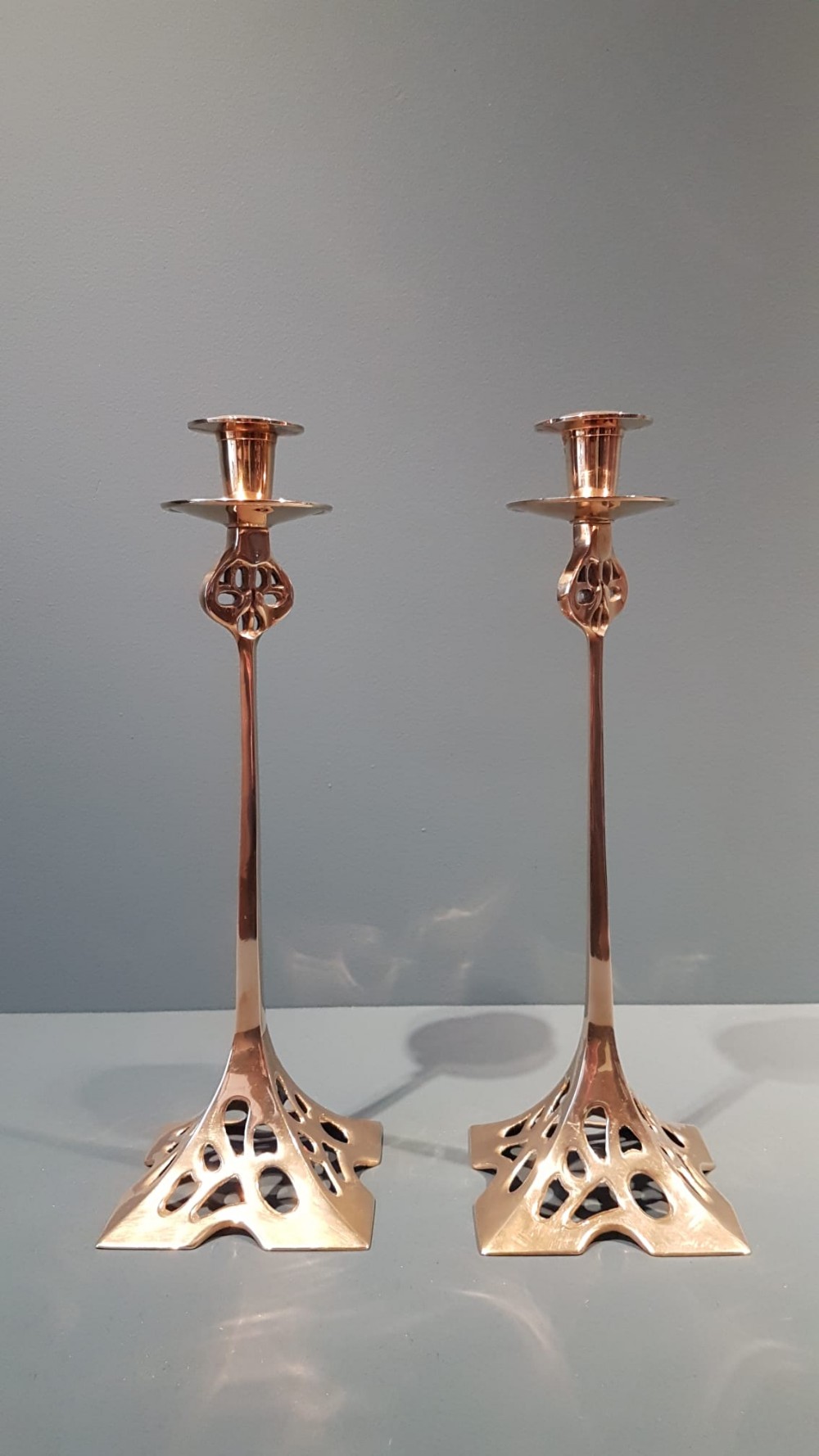 Matching Pair of Art Nouveau Brass Candlesticks