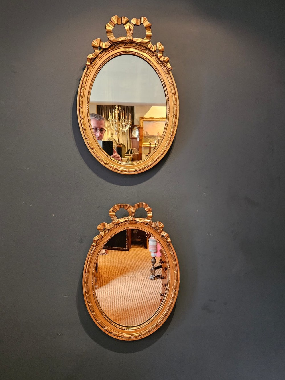 Pair of Victorian Small Oval Ribbon Pediment Gilt Mirrors