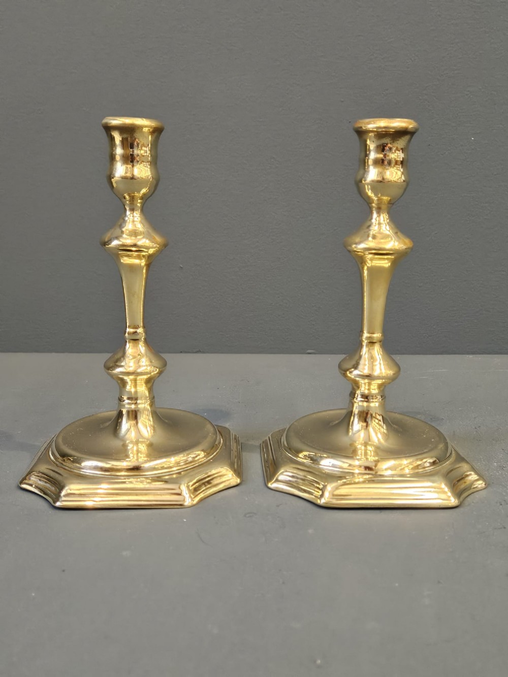 Pair of George III Seemed Brass Candlesticks