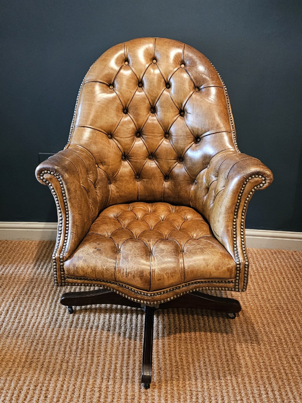 Deep Buttoned Leather Revolving and Rocking Chair