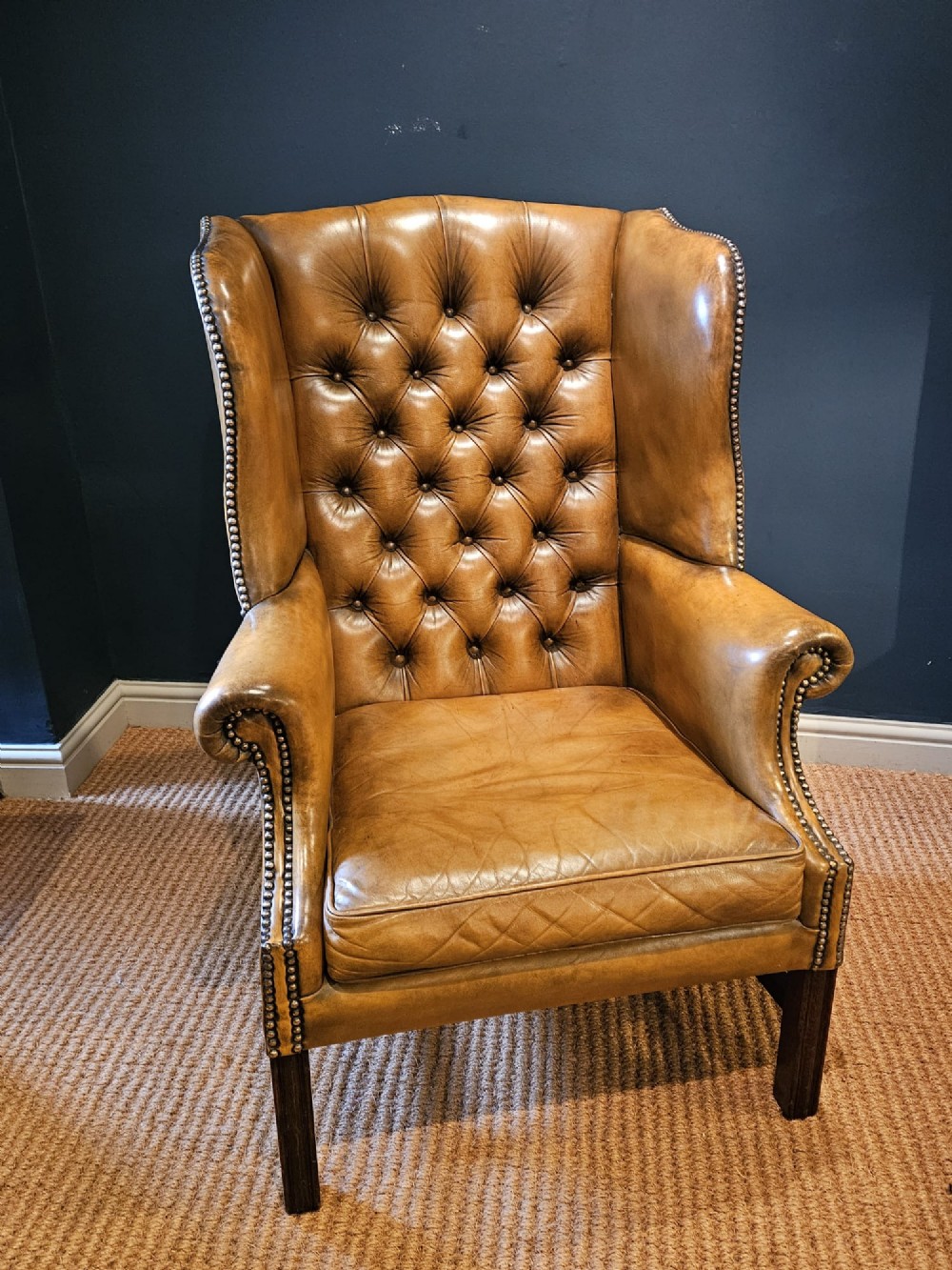 1930's Button Back Leather Wing Arm Chair