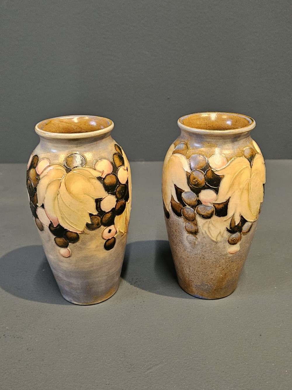 Matching Pair of Early Moorcroft Leaf and Berries Salt Glazed Vases