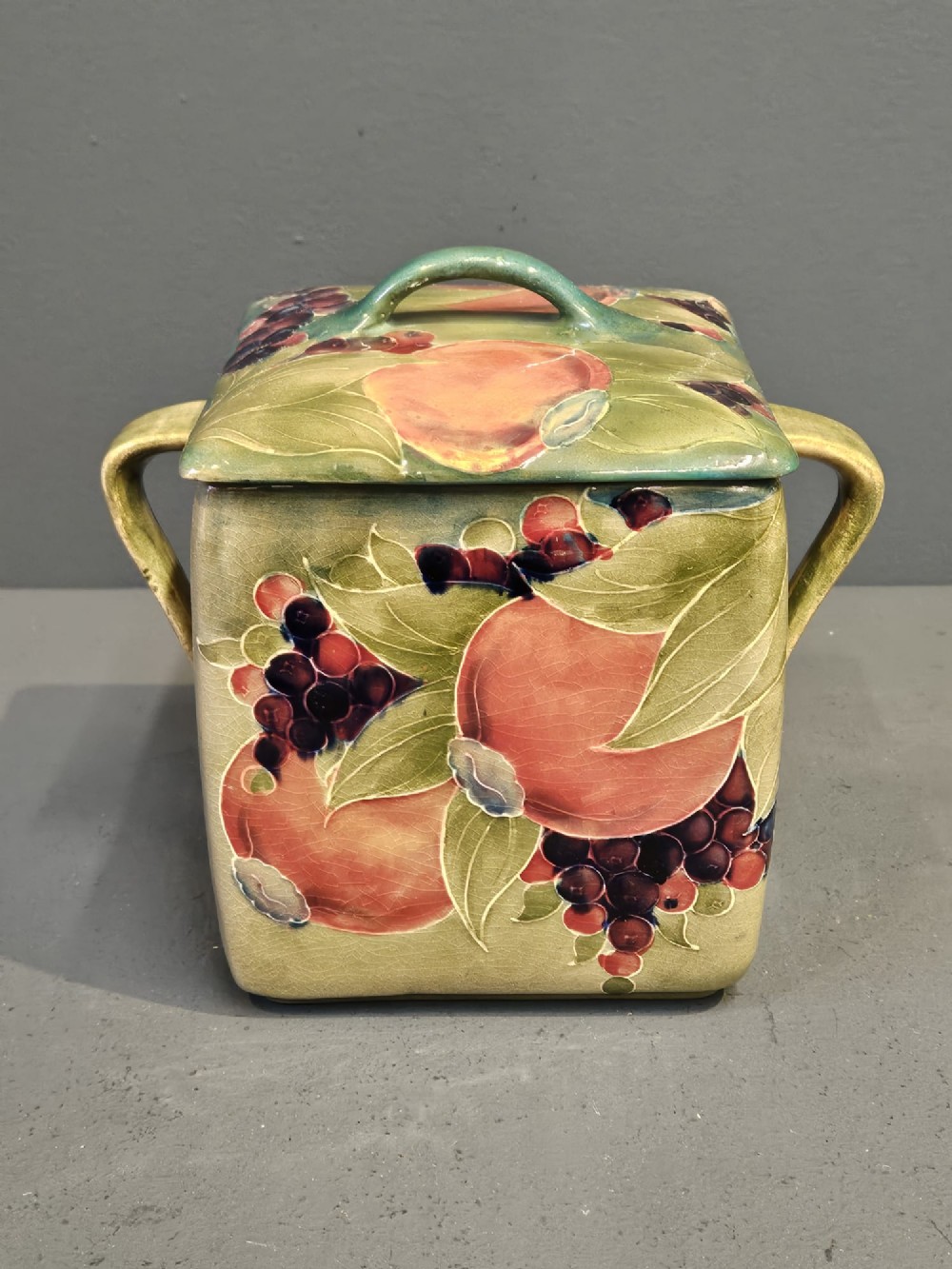 Early Moorcroft Green Pomegranate Twin Handle Biscuit Box and Cover