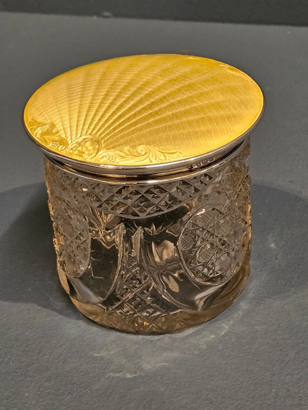 Silver and Engine Turned Yellow Enamel Top Cut Crystal Vase