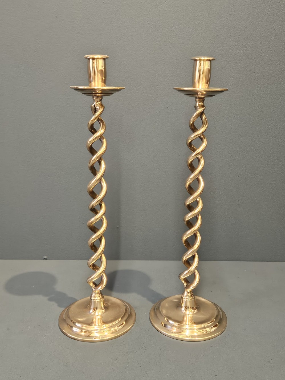Pair of Victorian Polished Bronze Barley Twist Candlesticks
