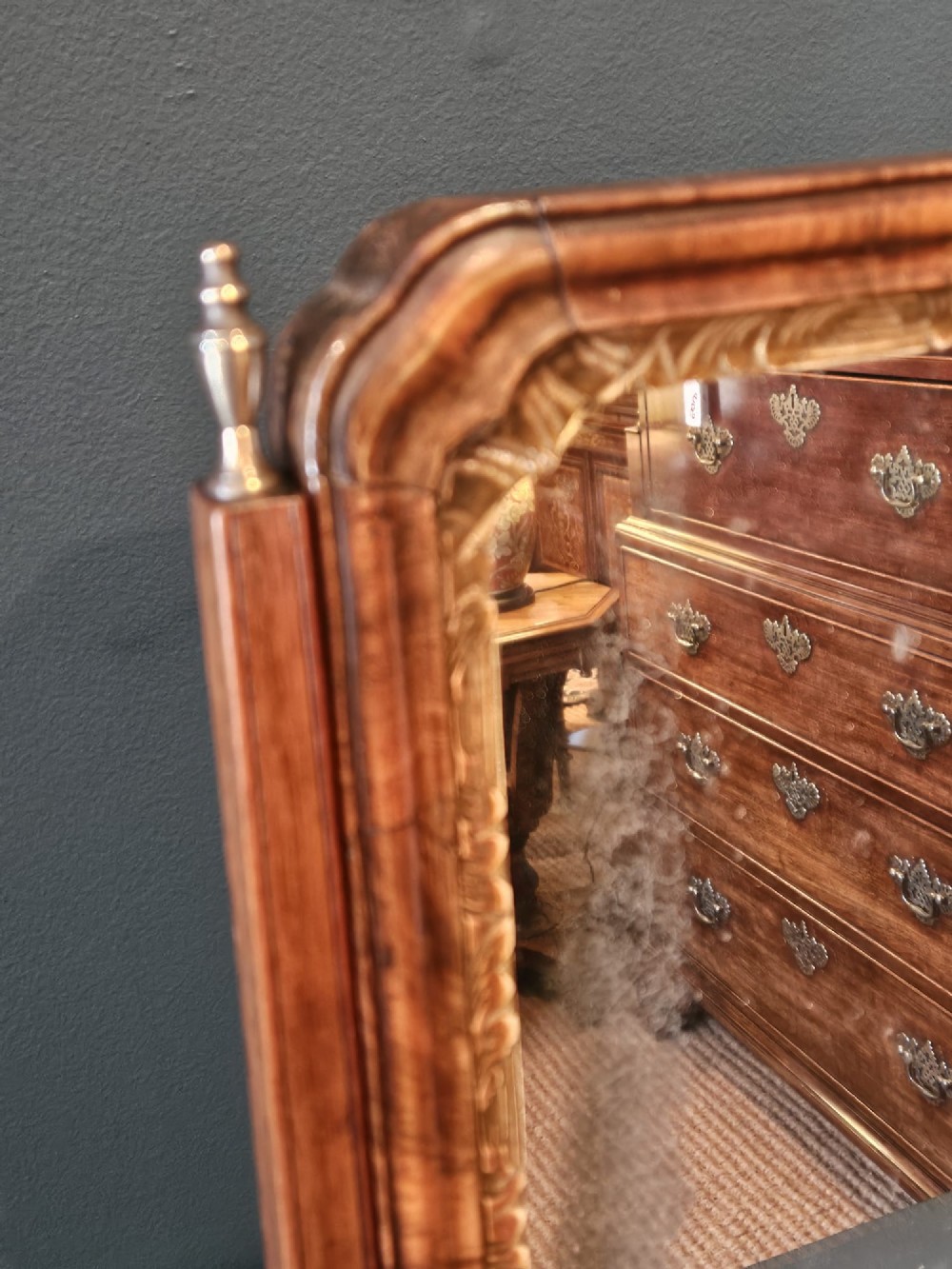 An 18th-century George II figured walnut toilet mirror featuring an adjustable frame with a gilded inner slip moulding above a single-drawer wooden base. View VII