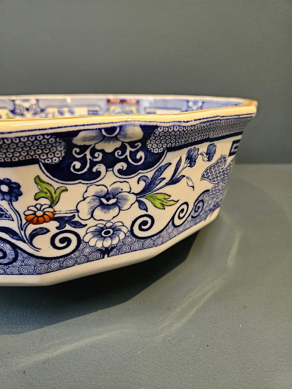 An octagonal Masons ironstone jug and matching wash basin decorated with polychrome floral Chinoiserie patterns and a cobalt blue gilded handle. View III