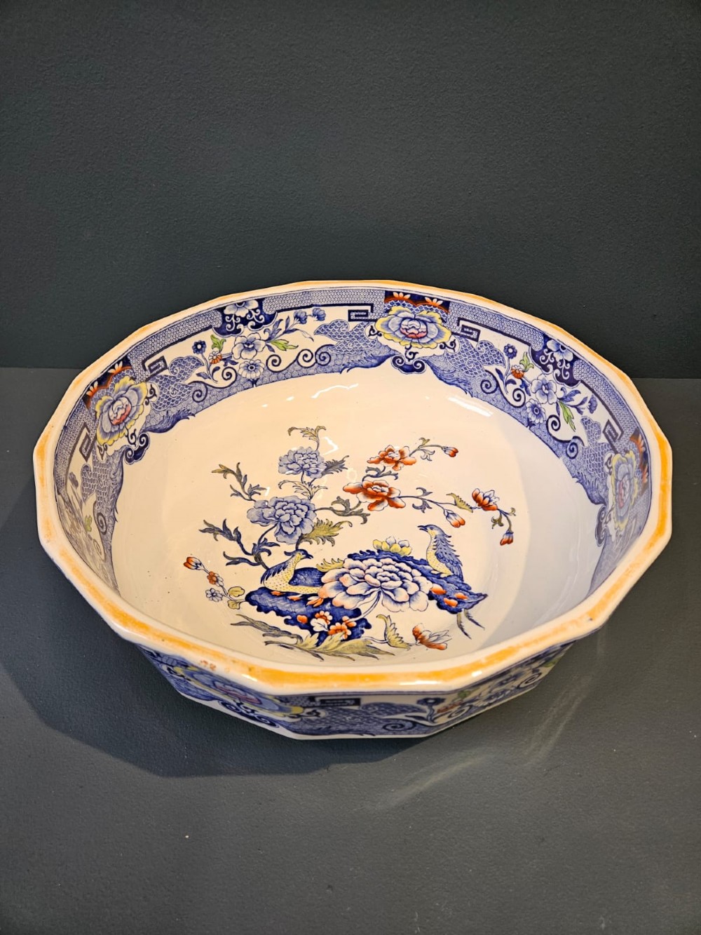 An octagonal Masons ironstone jug and matching wash basin decorated with polychrome floral Chinoiserie patterns and a cobalt blue gilded handle. View IV