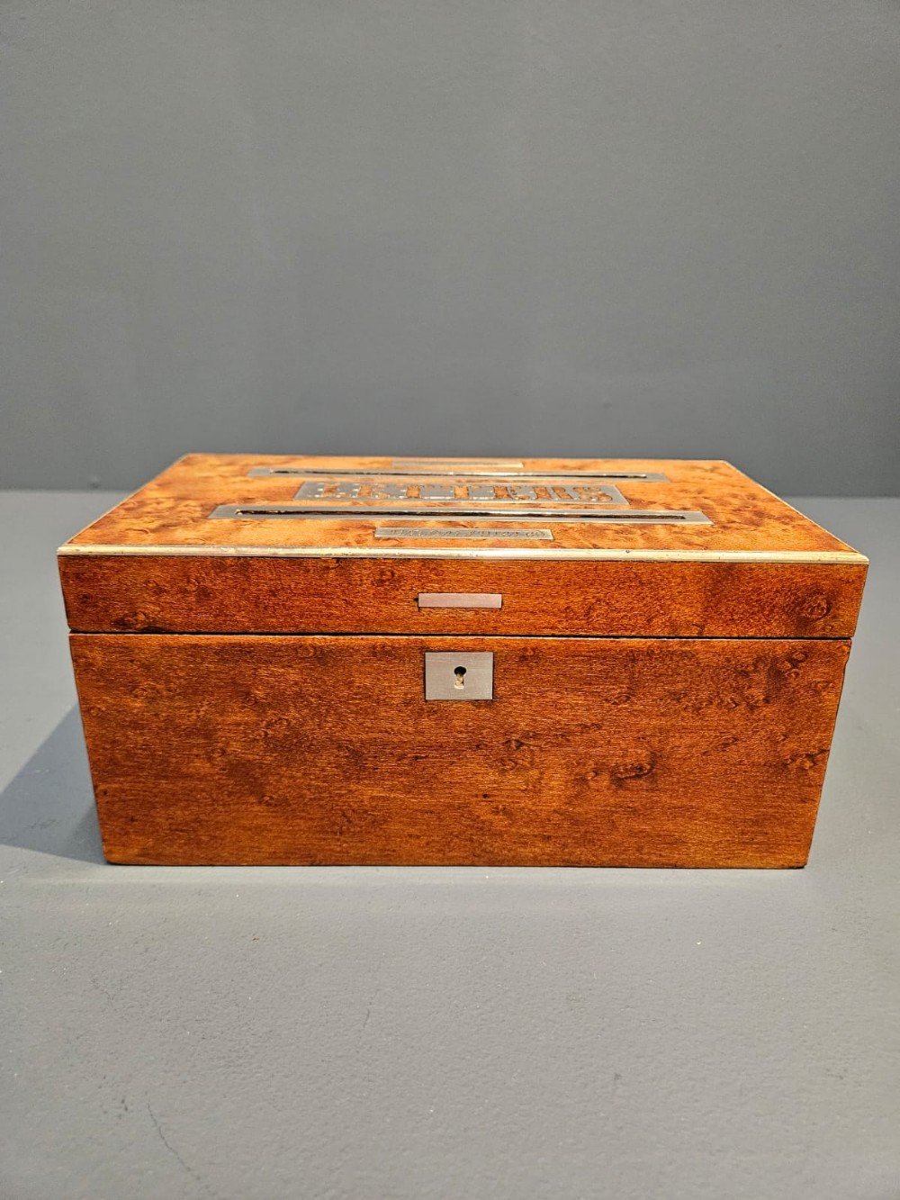 A Victorian burr satinwood desktop post box featuring slotted metal plates labelled letters, answered, and unanswered. View IX