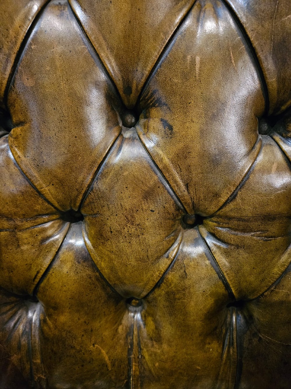 Matching Pair of 1930's Leather Wing Back Arm Chairs View II