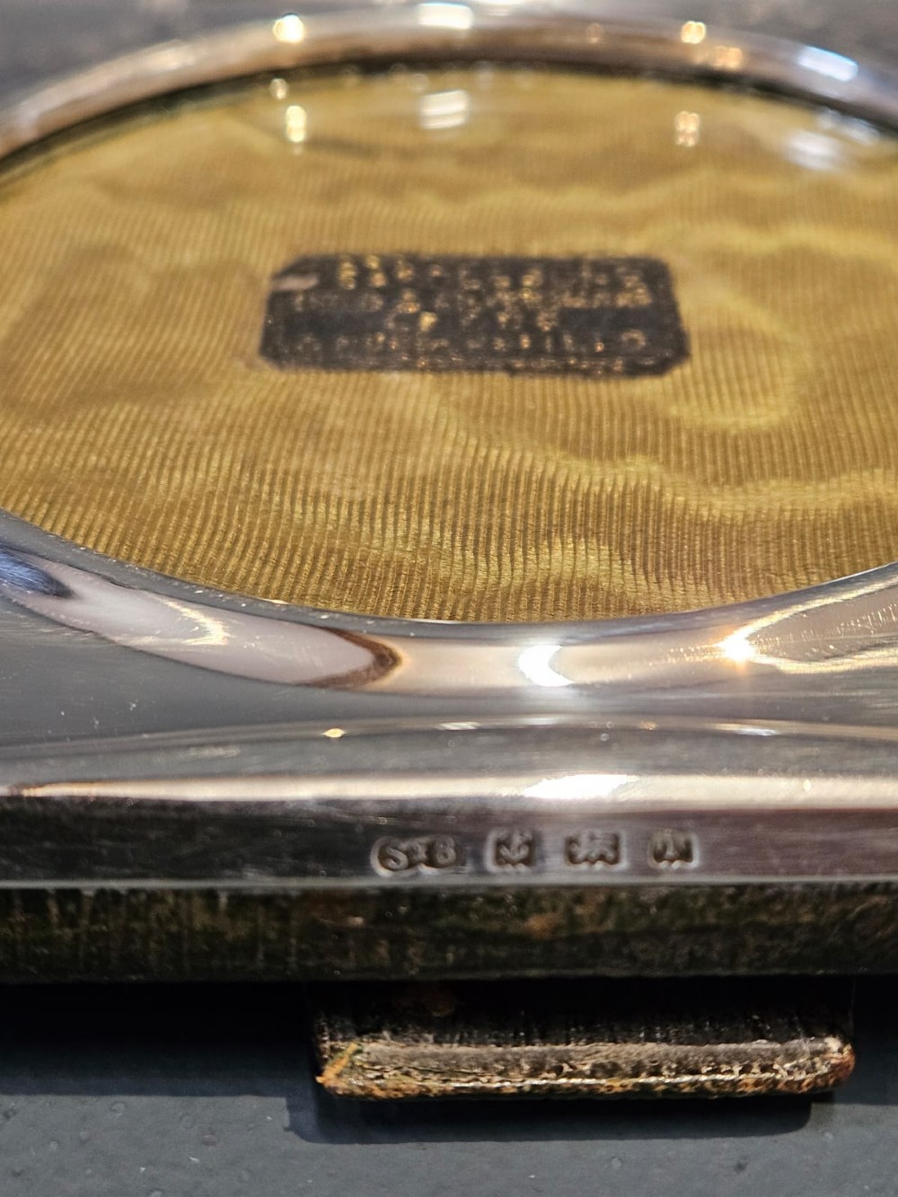 Square Edwardian silver photo frame with decorative engraved swags and a circular central window. View VII