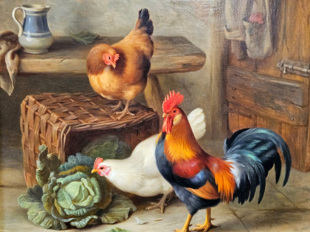 An oil painting on canvas depicting a cockerel and two hens inside a rustic barn beside a wicker basket and cabbage, enclosed in a heavily carved gold frame. View IV