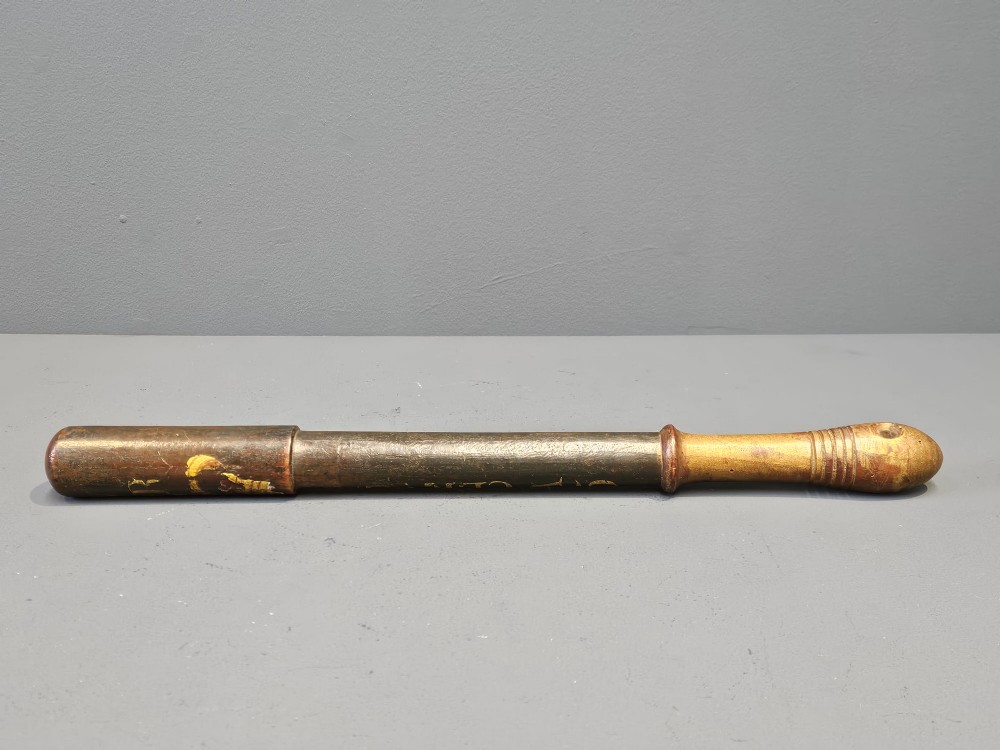 A turned dark hardwood police truncheon with hand-painted WR IV royal insignia, a crown, parish lettering reading CLEAVER A5, and a ribbed handle with a wrist strap hole. View V