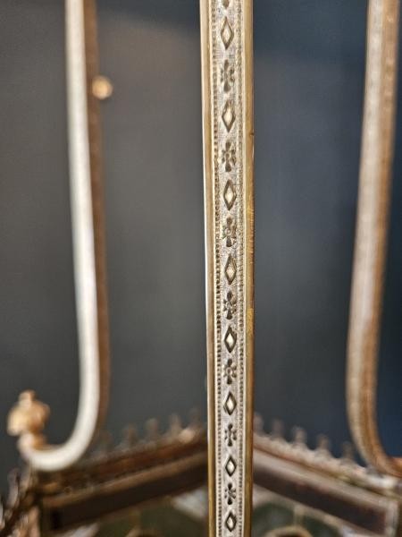 A vertical hexagonal brass hanging lantern featuring stained leaded glass panels with green, purple, and amber floral motifs. View VII