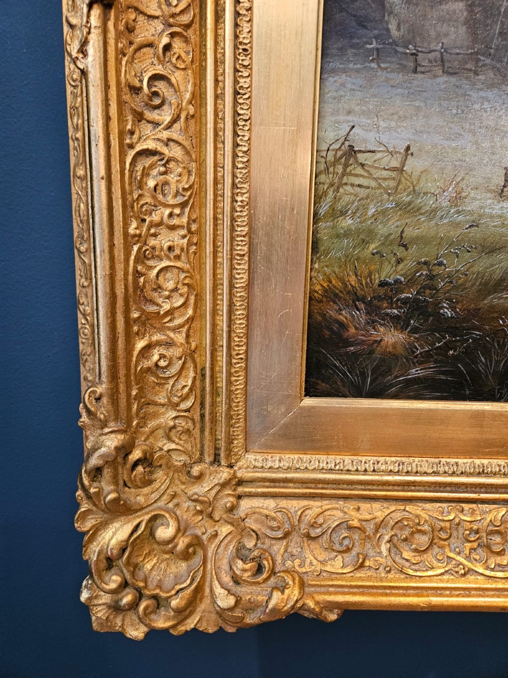 A 19th-century Victorian oil painting on canvas depicting a rural winter pastoral scene with cattle, set within an ornate gold gilt frame. View II