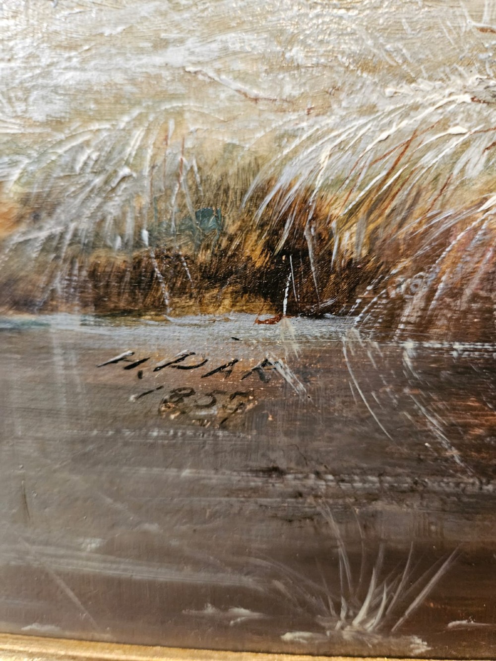 A 19th-century Victorian oil painting on canvas depicting a rural winter pastoral scene with cattle, set within an ornate gold gilt frame. View V