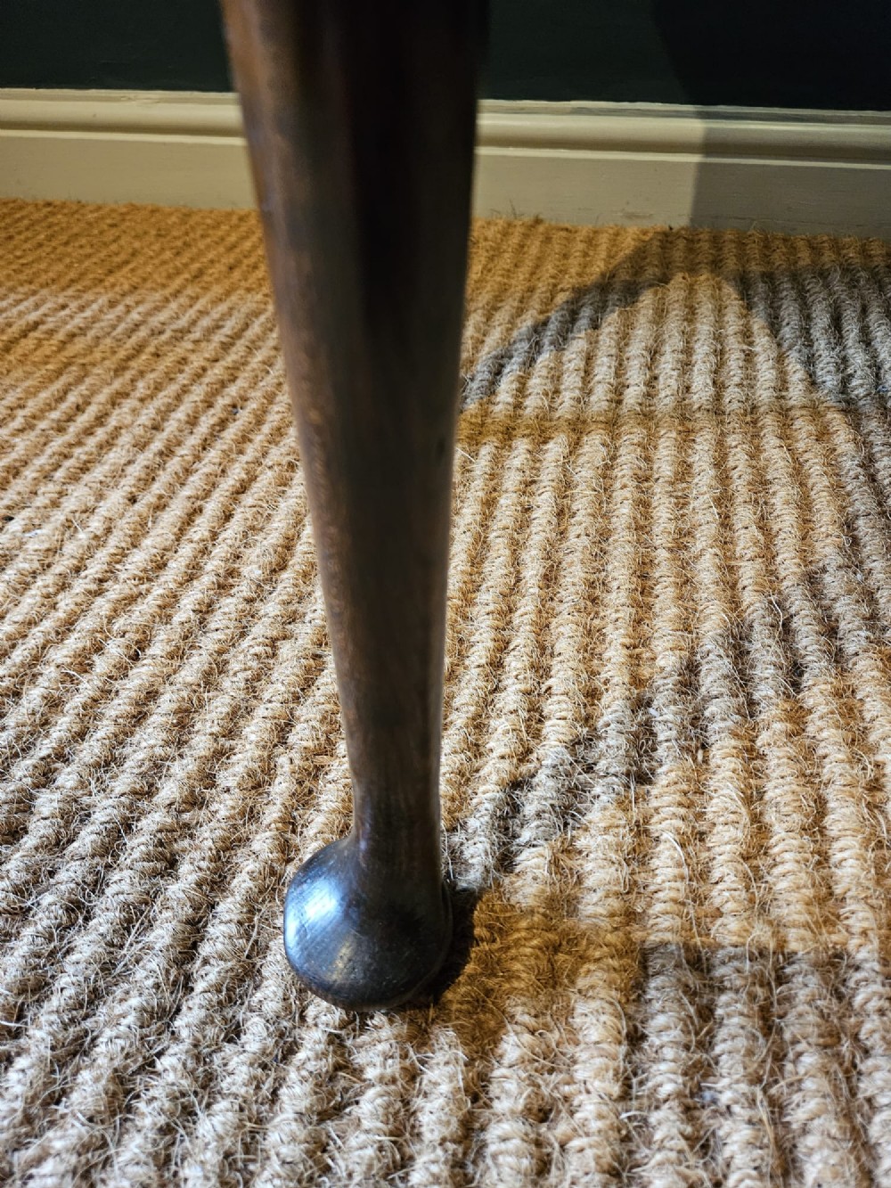 A George II dark oak side table with a single drawer, pierced brass handles, a shaped apron, and four cabriole legs terminating in pad feet. View VI