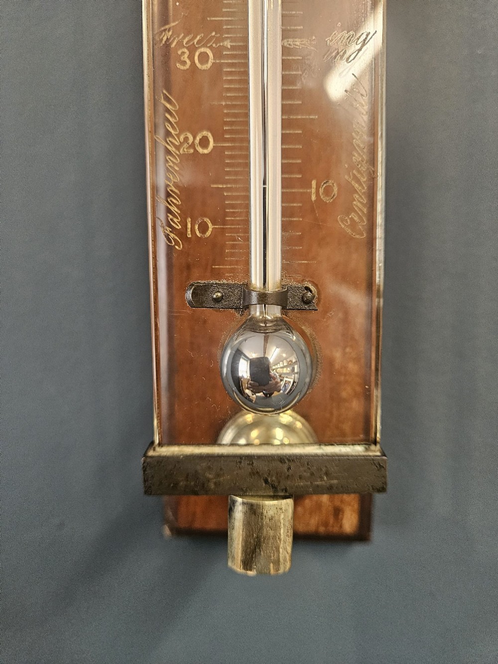 Victorian mahogany and brass wall thermometer with engraved Fahrenheit and Centigrade scales by Negretti and Zambra. View VI
