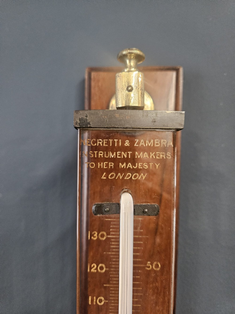 Victorian mahogany and brass wall thermometer with engraved Fahrenheit and Centigrade scales by Negretti and Zambra. View VII